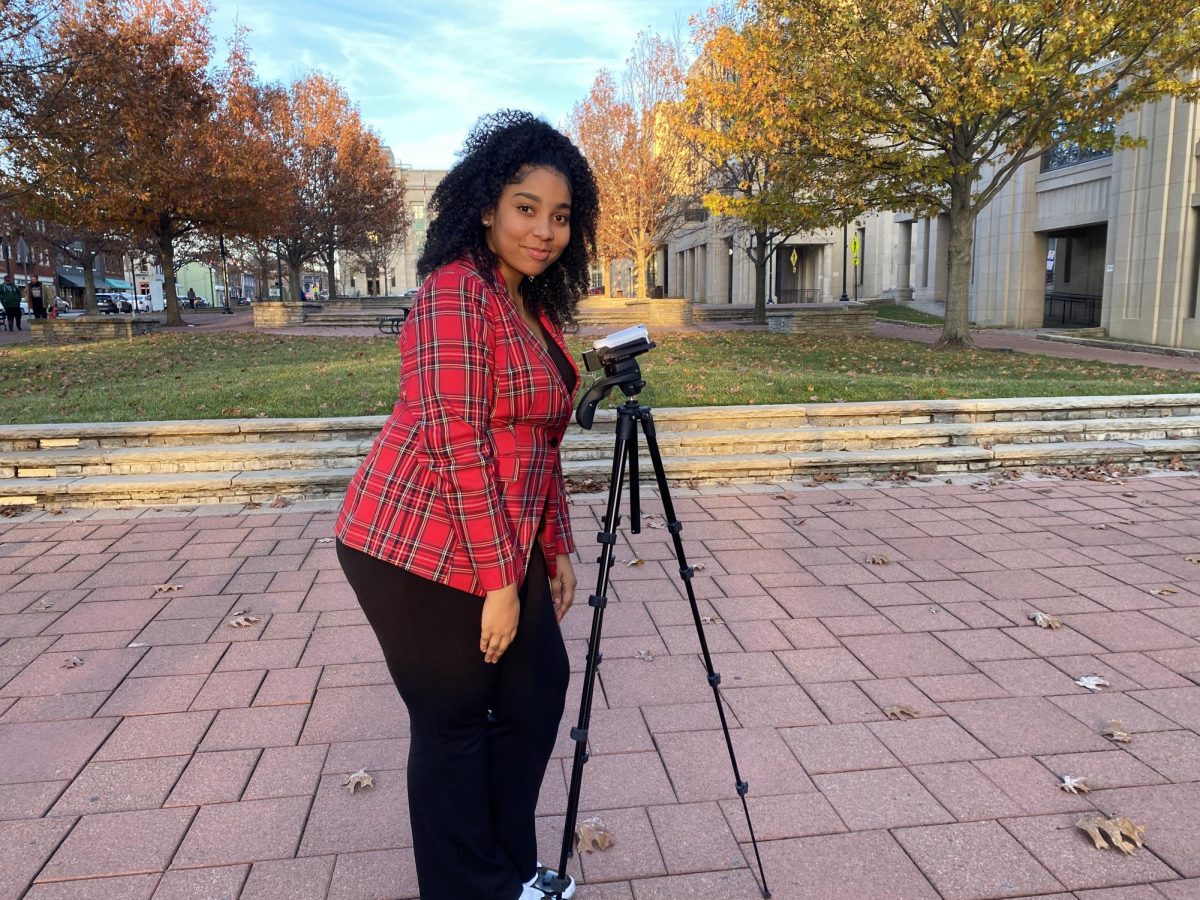 Zoey Washington records video outside the Fayette Circuit Court building in downtown Lexington
